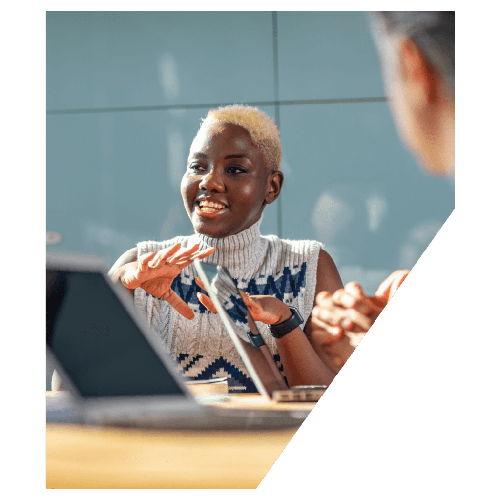 Woman smiling at meeting