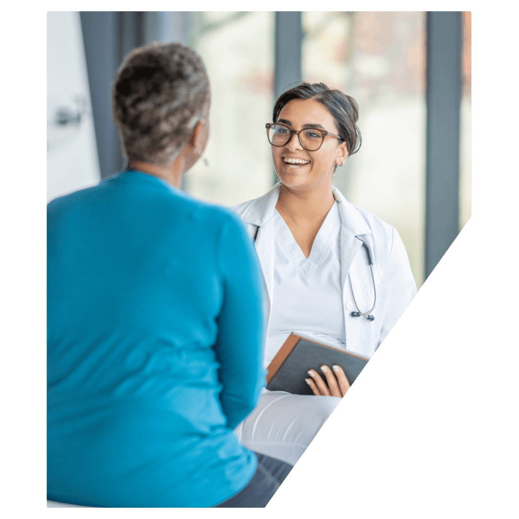 Doctor speaking with woman patient